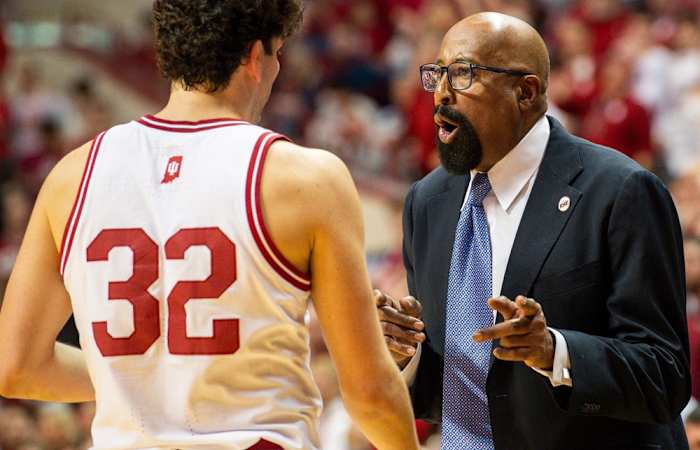 Indiana Head Coach Mike Woodson talks with Trey Galloway (32) during the second half of the Indiana versus Nebraska men's basketball game at Simon Skjodt Assembly Hall on Wednesday, Feb. 21, 2024.